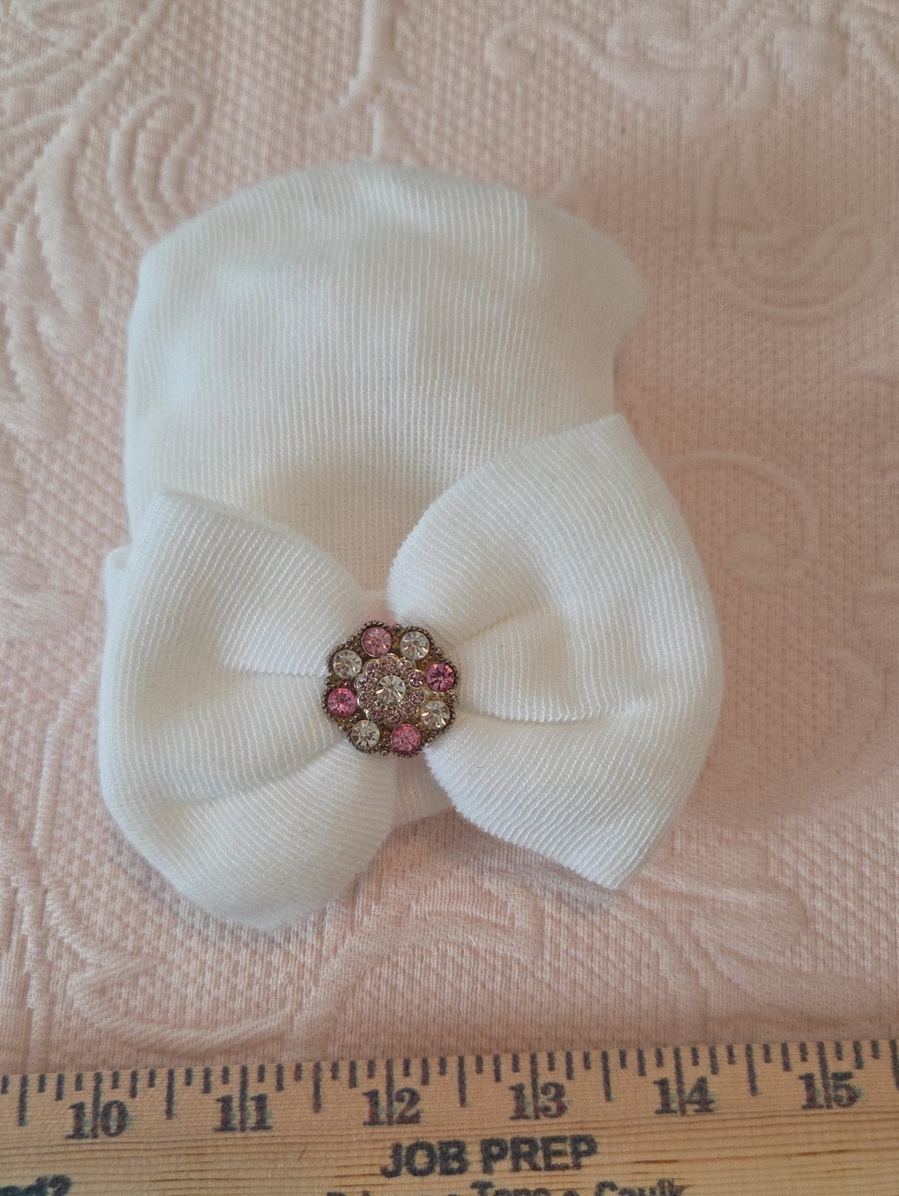 White Baby Bow Headband with Pink Rhinestone Accent